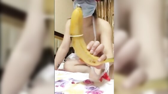 Chinese Slut Puts Banana Up Pussy