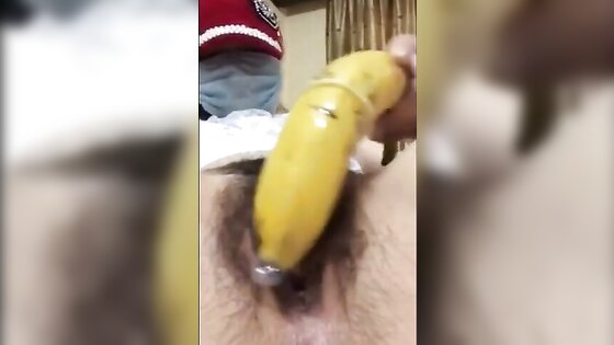 Chinese Slut Puts Banana Up Pussy