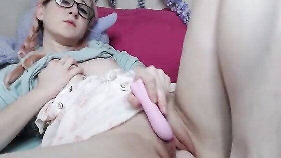 Horny Chick with glasses dildoing herself