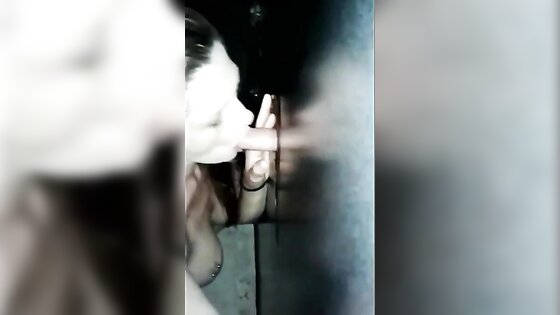 Girlfrind sucking in a gloryhole