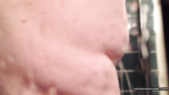plump stepmom spied up close in the shower