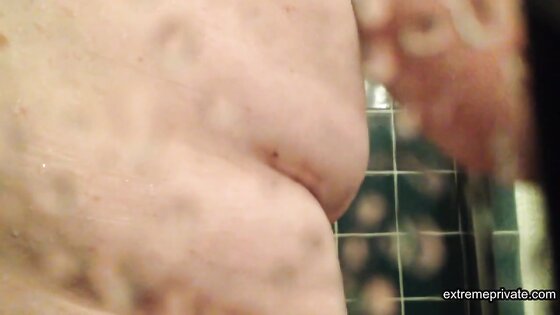 plump stepmom spied up close in the shower