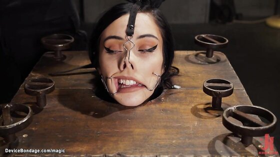 Thin slave tormented on device bondage