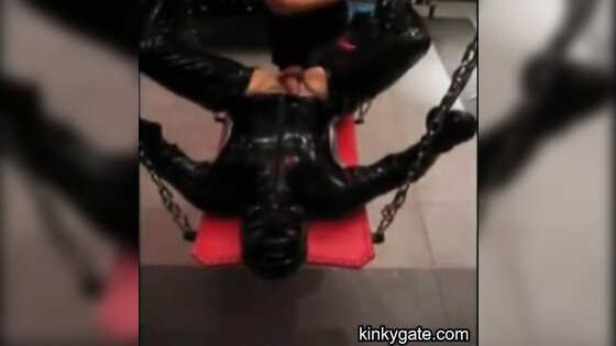 fucking my latex slave with a strapon