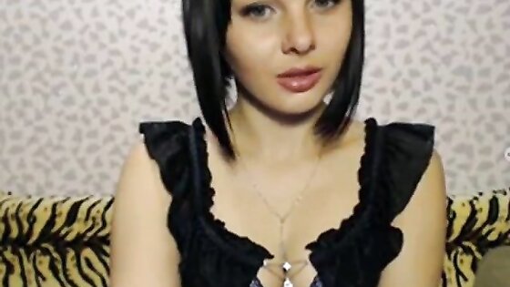 Russian girl dances a striptease and masturbates on webcam