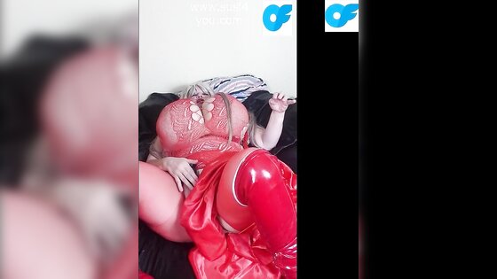 Susi is wearing a red fishnet suit fucking pussy with bbc toy