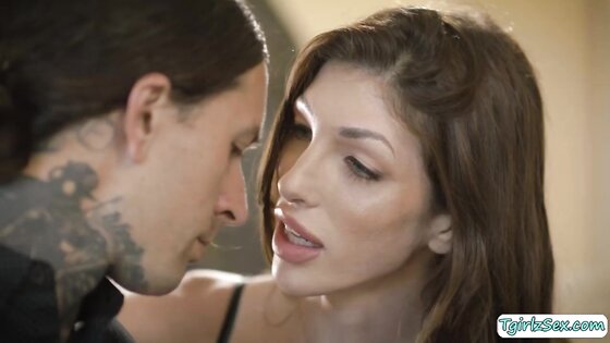 Brunette transexual blowjobs and fucks straight guy in couch