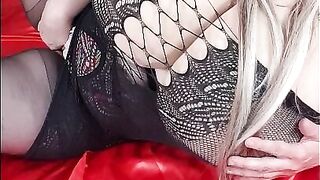 Susi is wearing black fishnet she is teasing with huge tits