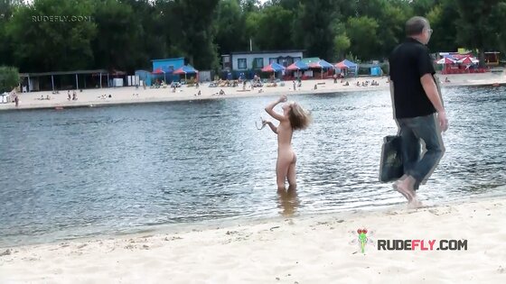 Young nudist babes secretly filmed by a voyeur having fun