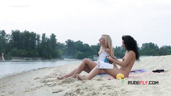 Ravishing nude beach girl caught on a hidden camera sunbathing outdoors