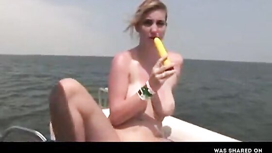Hot Amateur masturbates on a boat -