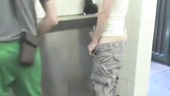 2 boys getting off in public toilet