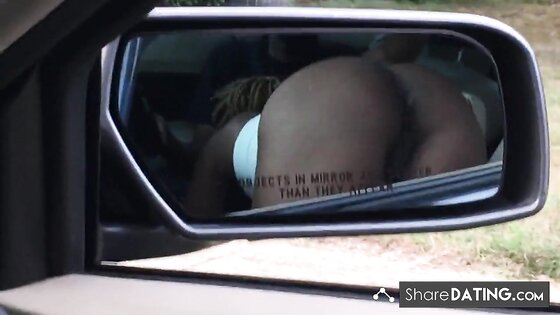 Black slut sucking dick in front seat of car