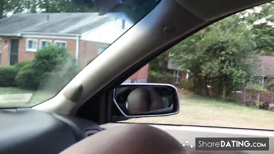 Black slut sucking dick in front seat of car