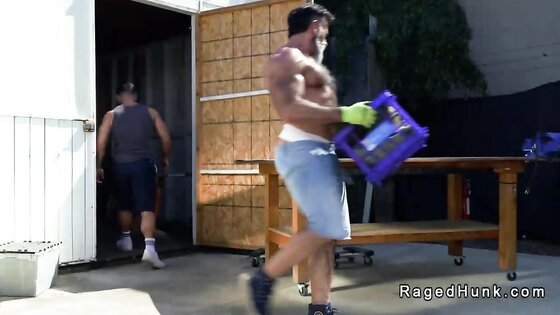 Threesome public gay anal sex outdoors in front of storage unit