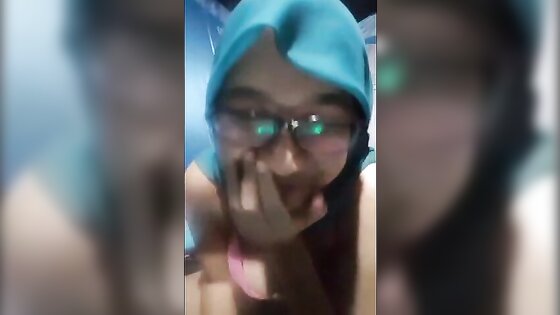 Chubby busty hijab jilbab slut with glasses showing off