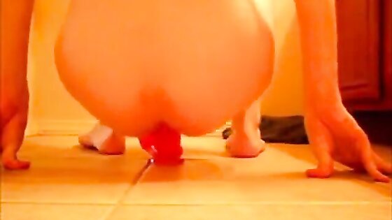 Juicy boy ass rides a thick dildo