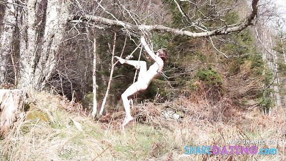 Naked self-bondage in the woods gone wrong.