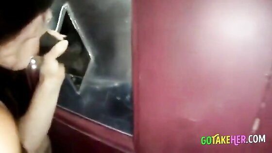 Gloryhole Brunette Takes on Multiple Cocks in a Kinky Adventure