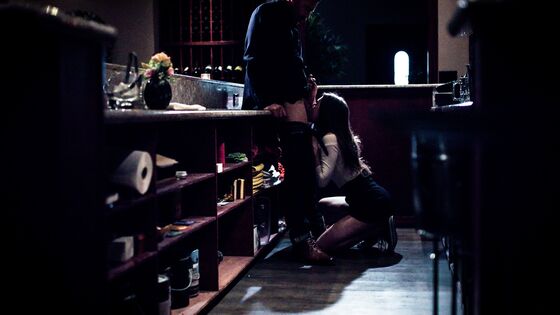 Waitress sucks her boss behind counter