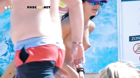 Beautiful fresh faced teen plays at the beach nude