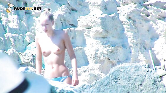Energetic young nudist chicks secretly filmed having fun