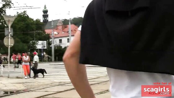 Naked Czech girl was walking through the city center