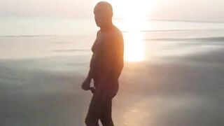 Daddy takes a stroll and blows the cameraman