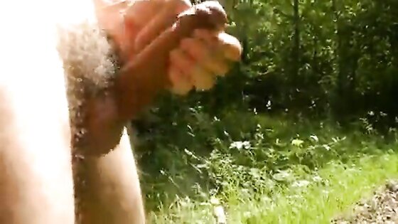 Naked cock play and cum in the sunny woods