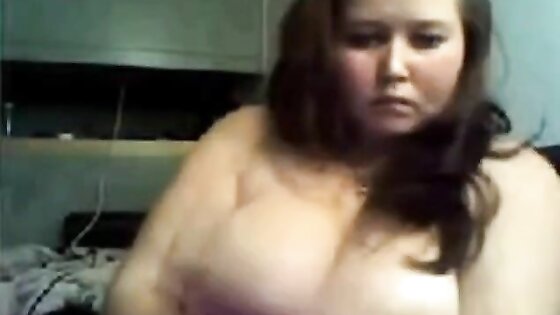 Chubby chick showing her tits on webcam