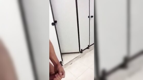 Risky wank in public bathroom