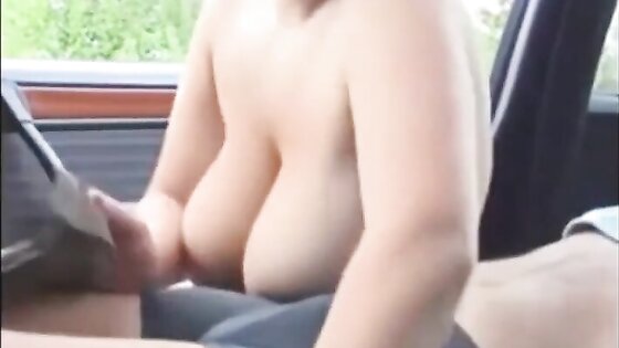 Big breasted girl has sex in the car.