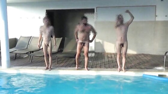 Four men at swimming pool