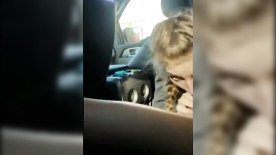Blonde college girl with braids sucks cock in the car