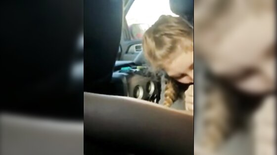 Blonde college girl with braids sucks cock in the car