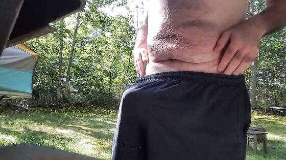 Jerking off outdoors in back yard cum shot public