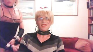 two nice clothed crossdressers in a blowjob-clip