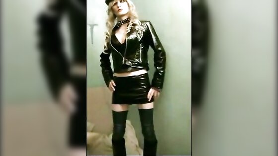Sissy Sandracduk posing in leather outfit
