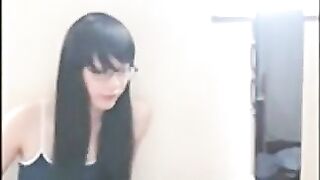 Cute Asian crossdresser cums on rubber cock