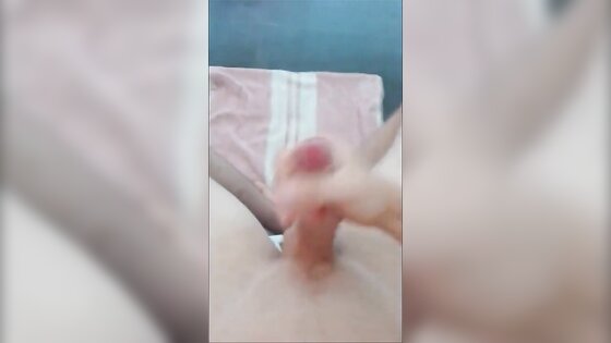 Boy jerking off uncut dick and cums