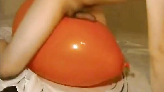 Big inflatable orange balloon humping cum