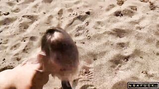 Cutie takes a cum load on her belly after sex on a beach
