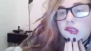 Naughty Chick with glasses masturbating and loving it